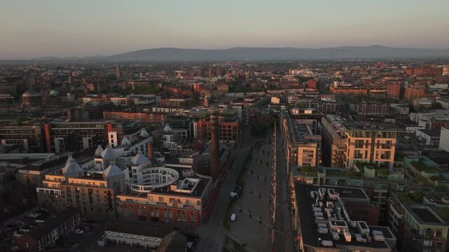 Breathtaking 4K Cinematic Drone footage capturing the magical golden hour sunrise over Smithfield Dublin, Ireland_44