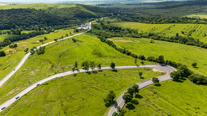 Winding mountain road through Oituz Pass, Romania