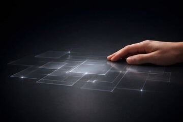 Hand resting on illuminated digital interface squares