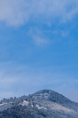Snow-Covered Summit of Mount Hiei Standing Under the Winter Sky Seen from Kyoto City