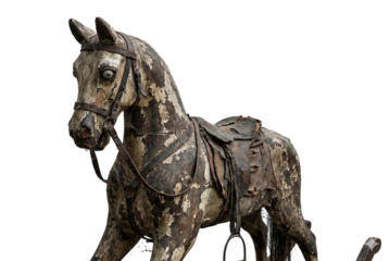 Worn vintage rocking horse with peeling paint texture