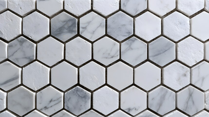 Elegant marble hexagon tile mosaic pattern featuring natural texture. This geometric background combines white and gray tones, creating a sophisticated modern design.