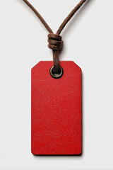 a red price tag on a string, 