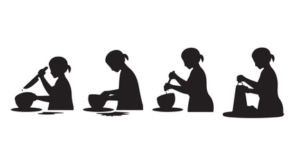 Silhouette of woman doing pottery on wheel in studio