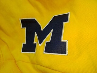 Embroidery text work Isolated on yellow, embroidery design, embroidery mockup on yellow fabric,embroidery logo, embroidery patchwork,3d products photography	