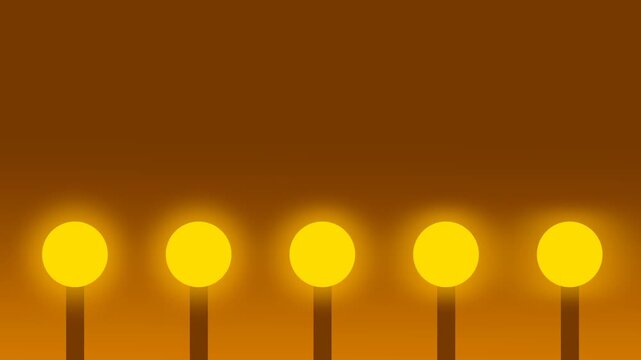 Five glowing yellow street lamps stand in a row against a warm orange background during the soft glow of a misty evening