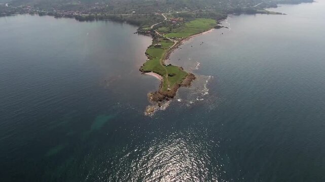Aerial view of promontory on a thin peninsula along the Black Sea coastline in Ordu Turkey. Elevated perspective highlights Yason Burnu headland near Persembe Anatolia.