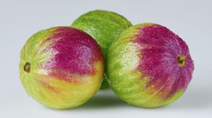 Freshly picked limes glistening with water droplets in bright natural colors