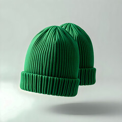 Realistic 3D mockup showcasing two stylish green beanie hats floating above a neutral background for fashion and apparel presentations, pair of green hat on isolated 