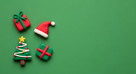 クリスマスのツリーとプレゼントとサンタ帽子のかわいいクレイアート背景