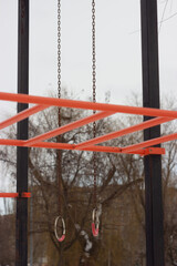 Gymnastic Rings on Playground in Winter, Outdoor Fitness