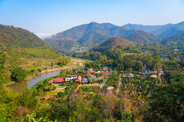 Scenic view of the Kok River and Ban Tha Ton village from the temple heights in Mae Ai, Northern Thailand