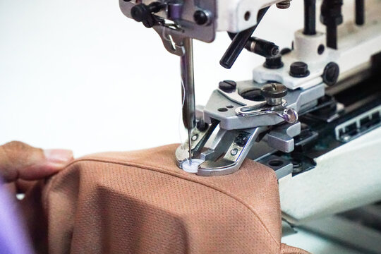 Fashion uniform Clothing Factory Manufacturing Process Showing Sewing, Quality Control Inspection, and Packing Steps in Textile and Apparel Industry