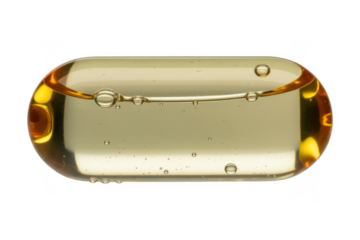 Close-up of a transparent yellow capsule with bubbles inside isolated on a transparent background