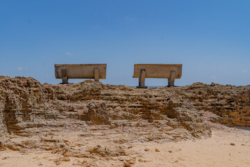 Two empty seats facing the sky