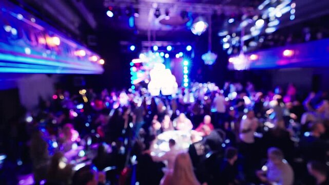 Lively ceremony illumination, Colorful event featuring illuminated stage and enthusiastic applause