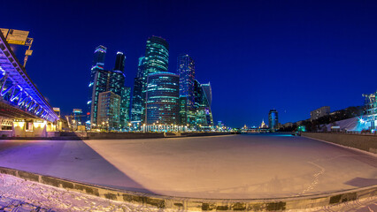 Moscow City skyscrapers in winter day to night timelapse.