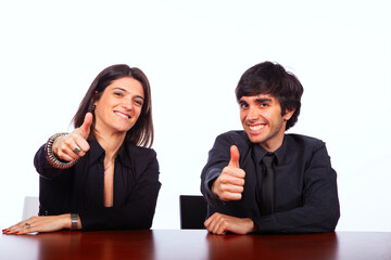 Men and woman gesturing OK