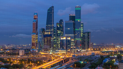 Naklejka premium Business complex of skyscrapers Moscow city day to night timelapse.