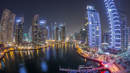 Beautiful aerial top view day to night transition timelapse of Dubai Marina canal