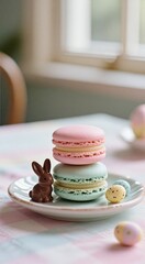 Pastel macarons and chocolate bunny on festive plate with mini eggs