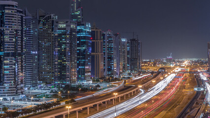 Aerial top view to Sheikh Zayed road near Dubai Marina and JLT day to night timelapse, Dubai.