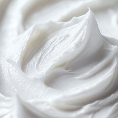 macro view of a thick, peaked swirl of moisturizing butter with a dense and rich texture.