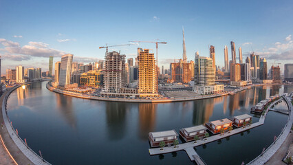 Fototapeta premium Dubai skyline at sunrise aerial timelapse