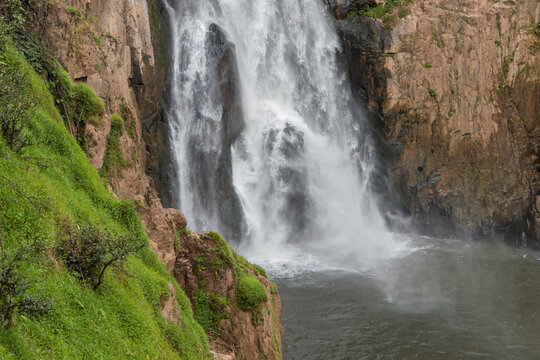 60-metre haew narok waterfall tumbling down cliff in khao yai national park, thailand