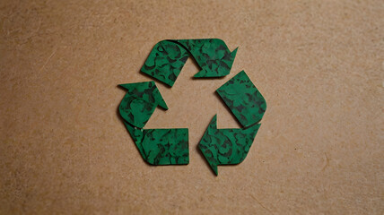 recycle symbol on wooden background