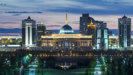 Close up view of Astana city day to night timelapse and the president's residence Akorda with park