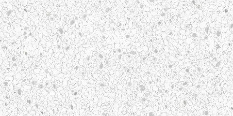 Obraz premium Close up of a white textured surface with scattered dark speckles