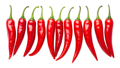 A line of vibrantly red chili peppers with green stems against a solid black background