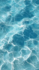 Obraz premium Sparkling Turquoise Waters: Capturing the mesmerizing dance of light and shadow, the image portrays the captivating surface of turquoise water.