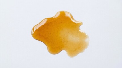 Grease stain with semi-transparent oil texture, isolated on a white background
