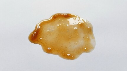 Grease stain with semi-transparent oil texture, isolated on a white background
