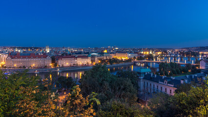 Evening Panorama of Prague with Vltava river and Prague Bridges day to night timelapse.