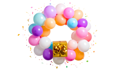 A circle of pastel-colored balloons encircles a gold wrapped present on black