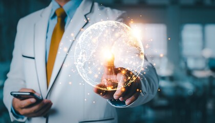 Businessman in white suit holding smartphone and glowing earth with connections and lines