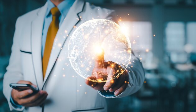 Businessman in white suit holding smartphone and glowing earth with connections and lines - Powered by Adobe