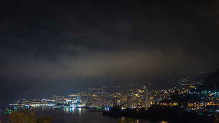Fototapeta premium Cityscape of Monte Carlo at night timelapse, Monaco.