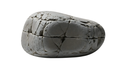 A close up view of a weathered cracked and aged stone or rock specimen with a rough texture on a black background