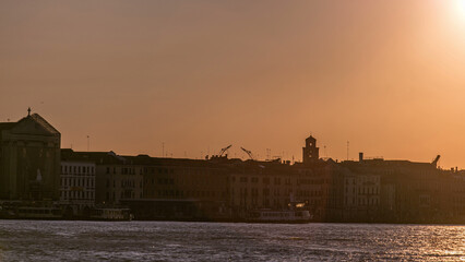 Beautiful sunrise in Grand canal over Venice near San Marco square timelapse. View from Church of Santa Maria della Salute, Venice, Italy, European Union.