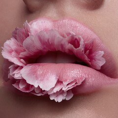 Surreal beauty close-up of soft pink flower petals shaped like lips, blending floral art and sensual portrait aesthetics. Conceptual fashion, romance, and creative beauty imagery.