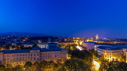 Panorama of the city center day to night timelapse with intersection in front of national theater and museum in Zagreb, Croatia.