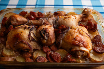Rustic Mediterranean chicken dinner with roasted potatoes and chorizo