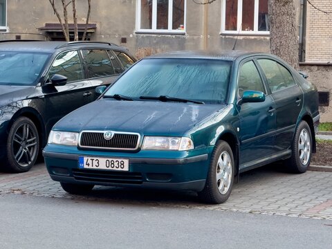 Blue Skoda Octavia Mk1 liftback car parked on street