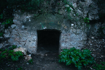 Ancient stone tunnel entrance in the Rock of Gibraltar &mdash; historic military passage