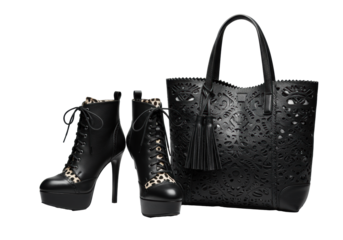 Stylish black leather lace-up high-heeled ankle boots and a matching structured tote bag with laser-cut design on a transparent background, high-end fashion sophistication