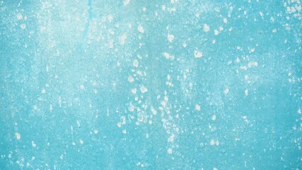 Blue grunge concrete background with cracked paint and saltpeter texture.